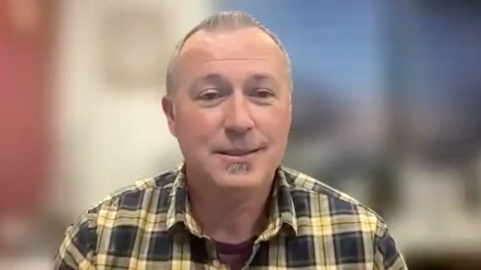A man speaking to camera in a video about partnering with Multipli.